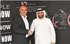  ?? Virendra Saklani/Gulf News ?? Ronaldo Mouchawar with Abdul Basset Al Janahi at the launch of their joint initiative. An MOU plan will help small businesses to launch their products on Souq.com.