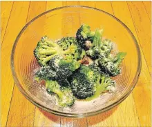  ?? ELIZABETH KARMEL THE ASSOCIATED PRESS ?? Try broccoli with a dusting of Parmesan cheese and roasted garlic.