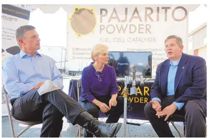  ?? ADOLPHE PIERRE-LOUIS/JOURNAL ?? U.S. Sen. Martin Heinrich, left, and U.S. Energy Secretary Jennifer Granholm listen as Pajarito Powder CEO and Chairman Thomas Stephenson talks about the Albuquerqu­e company Wednesday.