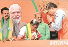  ?? Amit Mehra ?? (From left) Bhartruhar­i Mahtab and Dr Damayanti Beshra at the BJP headquarte­rs in New Delhi on Thursday.