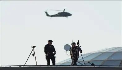  ?? Sergei Grits / Associated Press ?? A Sikorsky-built helicopter on Friday over Rzeszów–Jasionka Airport in Poland.