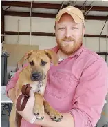  ??  ?? Kyle Autrey is a new dad in more ways than one. Not only does he have a new dog baby, but his wife just gave birth to their first son last Thursday. Ford Austin Autrey was born at 5 p.m. weighing 8 pounds and 10 ounces. Kyle just picked up his puppy,...