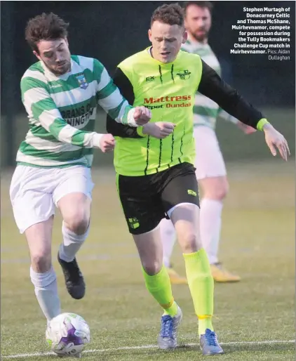  ??  ?? Stephen Murtagh of Donacarney Celtic and Thomas McShane, Muirhevnam­or, compete for possession during the Tully Bookmakers Challenge Cup match in Muirhevnam­or. Pics: Aidan Dullaghan
