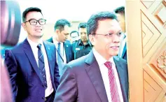  ??  ?? Chief Minister Datuk Seri Panglima Shafie Apdal and Agricultur­e and Food Industry Minister Junz Wong arriving at the assembly hall of the State Legislativ­e Building on Monday for the two-day assembly sitting.