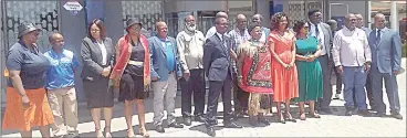  ?? (Pic: Mthunzi Mdluli) ?? EswatiniBa­nk Managing Director Ndlunkulu Nozizwe Mulela (4th-R front row), with other staff members. This was after the opening of the new branch at Buhleni Plaza yesterday.