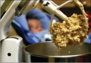  ?? LARRY CROWE — ASSOCIATED PRESS FILE PHOTO ?? Sampling holiday cookie dough, or any raw dough, can make you sick. And recent research says it’s not just because dough often contains raw eggs, which may harbor salmonella bacteria. Raw flour is another culprit.