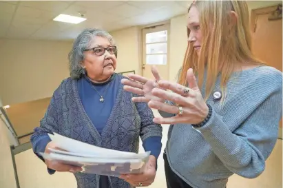  ?? PHOTOS BY EBONY COX / MILWAUKEE JOURNAL SENTINEL ?? Oneida Nation Stroke Prevention Wellness Coach Amanda Riesenberg, right, speaks with study participan­t Marlene Summers at a health education event. “One question I ask people when we’re working on wellness visions is: ‘What makes you thrive? What makes you feel like you?’ ” Riesenberg said. “‘What can we do to get you to that point?’ ” Riesenberg said she likes working with Summer because she wants to better her own health and her community’s health.