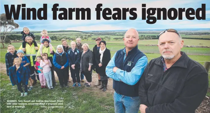  ?? Picture: GLENN FERGUSON ?? WORRIED: Tony Russell and Andrew Maschmedt (front) with other residents concerned about a proposed wind farm at Inverleigh.