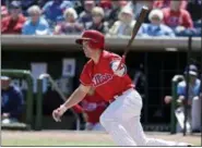  ?? JOHN RAOUX — THE ASSOCIATED PRESS FILE ?? The Philadelph­ia Phillies’ Scott Kingery connects on a hit during a spring training game last week in Clearwater, Fla. Kingery has shown the Phillies he’s ready to play in the majors even if it takes a bit longer for him to get there.