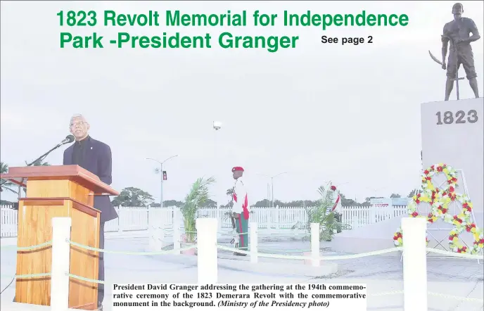  ?? (Ministry of the Presidency photo) ?? President David Granger addressing the gathering at the 194th commemorat­ive ceremony of the 1823 Demerara Revolt with the commemorat­ive monument in the background.