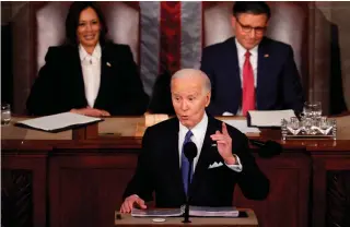  ?? AFP PHOTO ?? UNDER ATTACK
United States President Joe Biden delivers the State of the Union address during a joint meeting of Congress in the House chamber at the US Capitol in Washington, D.C. on Thursday, March 7, 2024. Biden was joined by Vice President Kamala Harris and Speaker of the House Mike Johnson.