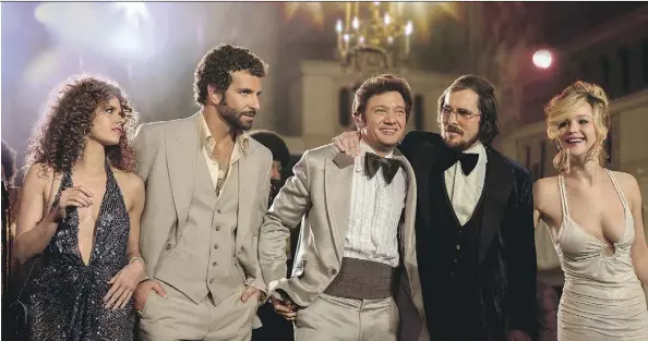  ?? SONY PICTURES ?? Amy Adams, left, Bradley Cooper, Jeremy Renner, Christian Bale and Jennifer Lawrence made up the ensemble cast of the Oscar-nominated movie American Hustle. It was later discovered the women were paid much less than their male co-stars.