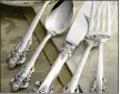  ?? SILVERSUPE­RSTORE.COM ?? Not everyone who inherits the family silver appreciate­s the value. One fivepiece place setting of sterling silver, like this Wallace Grande Baroque pattern, can cost close to $1,000.