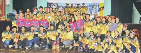  ??  ?? Players of Miri’s X-Tune make a clean sweep at the 13th Sarawak Indoor Championsh­ip. Standing at sixth from right is Yap Jin.