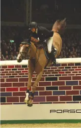  ??  ?? Laura wins Olympia’s puissance on Top Dollar VI, whom she is aiming at Tokyo 2020