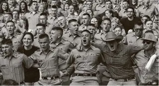  ?? Godofredo A Vásquez / Staff photograph­er ?? If social distancing regulation­s are in effect for college football this fall, Kyle Field traditions such as singing the “Aggie War Hymn” could look a lot different.