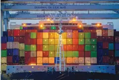  ?? STEPHEN B. MORTON/ASSOCIATED PRESS ?? Ship-to-shore cranes work the container ship Laperouse at the Port of Savannah (Ga.) on Sept. 29. In September, U.S. exports plunged 3% to $207.6 billion, while imports rose 0.6% to $288.5 billion.