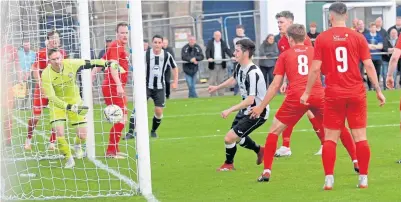  ??  ?? Sean Butcher scores for Fraserburg­h against Brora Rangers