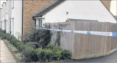  ??  ?? SCENE: A sealed off road the day after the stabbing in West Drayton on the night of Saturday February 4