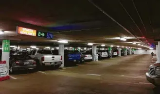  ?? Houston First ?? The undergroun­d Theater District Parking Garage serves visitors with 3,369 spaces. “Signage and wayfinding improvemen­ts are routinely and continuall­y being made,” says the general manager of Republic Parking, the contractor that operates the city-owned...