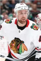  ?? TONY GUTIERREZ/AP ?? Blackhawks defenseman Calvin de Haan hopes a different type of surgery will solve his shoulder problems.