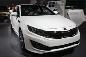  ?? NAM Y. HUH — THE ASSOCIATED PRESS FILE ?? A 2013 Kia Optima is displayed at the Chicago Auto Show in Chicago on Feb. 9, 2012. In September 2023, Hyundai and Kia issued a recall of 3.4million of its vehicles in the United States, including the 2013Kia Optima.