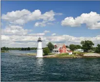 ?? GETTY IMAGES ?? A lighthouse stands guard on the Thousand Islands on New York's St. Lawrence River, named one of the top fishing destinatio­ns in the country by Abu Garcia, the fishing equipment manufactur­er.