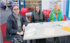  ?? ?? Pamela Dais, Allie Lundon and Leika McIver on Thursay also had fun making combined poems together at Dannevirke.