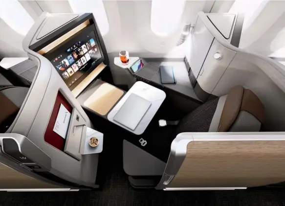  ?? ?? The new American Airlines Flagship Suite provides more space than its current cabins