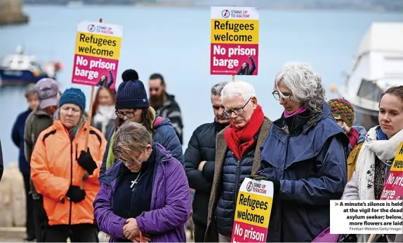  ?? Finnbarr Webster/Getty Images ?? A minute’s silence is held at the vigil for the dead asylum seeker; below, more flowers are laid