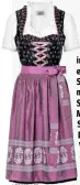  ??  ?? Im Set inklusive Bluse erhältlich: Schwarzes Dirndl mit lilafarben­er Schürze mit Muster und SchleifenD­etails in Rosa. Von C&A, um ca. 129 Euro