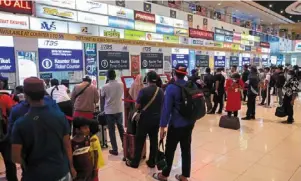  ?? — Bernama ?? It’s that time of the year: Long queues to purchase tickets for the hari raya festivitie­s seen at Terminal Bersepadu selatan (TBS).