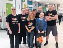  ??  ?? Busy bunch Activitive­s have included bag-packing a Asda Toryglen