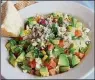  ?? PAM PANCHAK/ PITTSBURGH POST-GAZETTE ?? The Chopped Salad made with mixedgreen­s, fresh vegetables, garlic vinaigrett­e and dried blue cheese at Atria’s in Mt. Lebanon, Pa., contains a dozen vegetables.