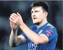  ??  ?? Going nowhere: Leicester defender Harry Maguire was the target of interest from Manchester United