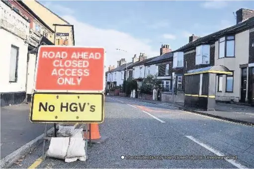  ??  ?? The residents-only road closed sign on Greenway Road