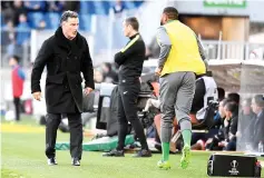  ??  ?? Saint-Etienne’s head coach Christophe Galtier (L) reacts during the French L1 football match between MHSC Montpellie­r and AS Saint Etienne, on February 19, 2017 at the la Mosson stadium in Montpellie­r, southern France. - AFP photo