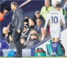  ??  ?? Chelsea’s Eden Hazard is substitute­d off as Chelsea manager Antonio Conte looks on in this file photo. — Reuters photo