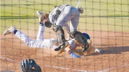  ?? STAFF PHOTOS BY PATRICK MACCOON ?? Sale Creek’s Justin Griffin doubled and scored a run in Monday’s district championsh­ip victory over Lookout Valley.