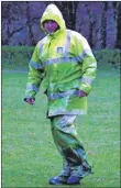  ??  ?? All dressed for the weather, groundsman Ian Hay.