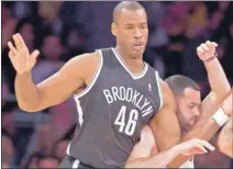  ?? MICHAELGOU­LDING/ MCT ?? The Nets’Jason Collins ( 46) puts a screen on the Lakers’ Jordan Farmar. Collins became the NBA’s first openly gay player.