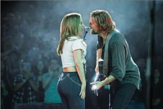  ?? CONTRIBUTE­D BY CLAY ENOS/WARNER BROTHERS ?? Lady Gaga and Bradley Cooper in “A Star Is Born.”