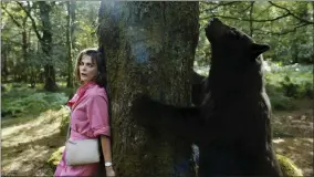  ?? PAT REDMOND/UNIVERSAL PICTURES VIA AP ?? This image released by Universal Pictures shows Keri Russell in a scene from “Cocaine Bear,” directed by Elizabeth Banks.