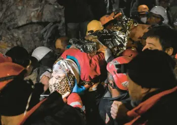  ?? BULENT KILIC/GETTY-AFP ?? After being trapped for 210 hours, a teenager is carried to an ambulance Tuesday in Hatay, Turkey.