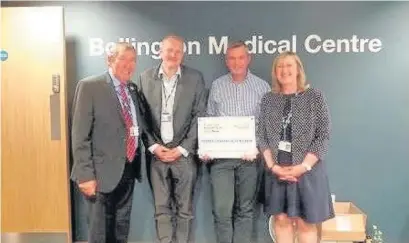  ??  ?? ●● From left are Paul Hedgeland of Greater Manchester CRN, Neil Evans from NHS Eastern Cheshire CCG, Dr Pete Wilson from Bollington Medical Centre and Debbie Vinsun from Greater Manchester CRN