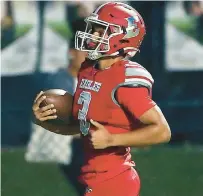  ?? STEPHEN M. DOWELL/ORLANDO SENTINEL ?? Edgewater quarterbac­k Chase Carter ran for two touchdowns in the Eagles’ FHSAA region semifinal victory against Tampa Bay Tech on Friday.