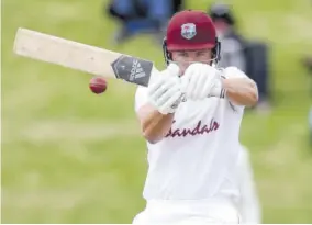  ?? (Photos: AFP) ?? West Indies’ Joshua Da Silva plays a pull shot during the fourth day of the second cricket Test match versus New Zealand at the Basin Reserve in Wellington on December 14, 2020.