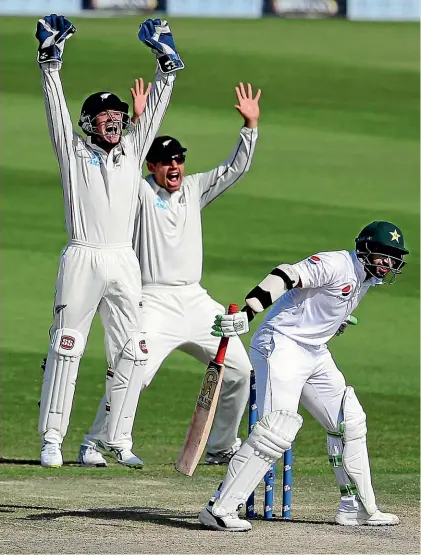  ?? AP ?? New Zealand’s BJ Watling, left, and Ross Taylor successful­ly appeal for the dismissal of Pakistan’s Imam-ul-Haq, who made 27, on the fourth day of the first cricket test in Abu Dhabi, United Arab Emirates, yesterday. However, their efforts were seemingly in vain as Pakistan went to lunch on 130-4, needing only a further 46 runs for victory. For match report go to stuff.co.nz.