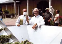  ??  ?? Bishop Myron J. Cotta and St. Jorge Winery owner Vern Vierra have been good friends since the former was assigned to the Diocese of Stockton in 2018. Monday's blessing of the grapes was the first for Cotta.