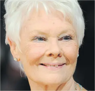  ?? ANTHONY HARVEY/ GETTY IMAGES ?? Judi Dench was establishe­d as a British stage actress when she landed a film role in Mrs. Brown 18 years ago.